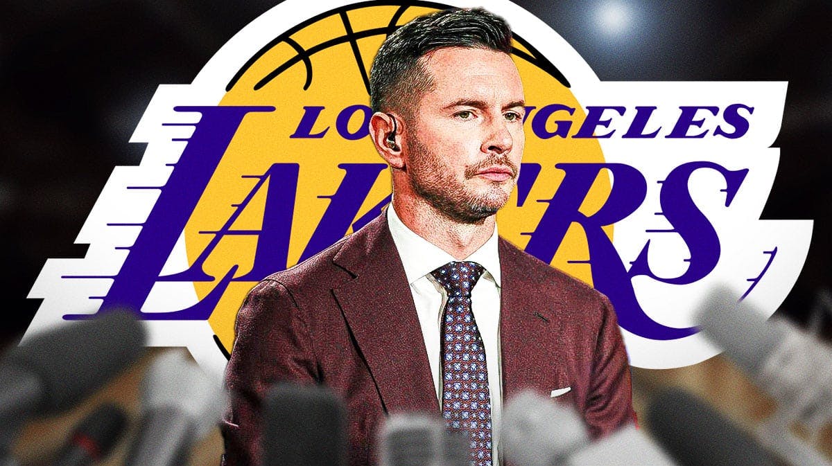 JJ Redick looking serious with Lakers logo in the background
