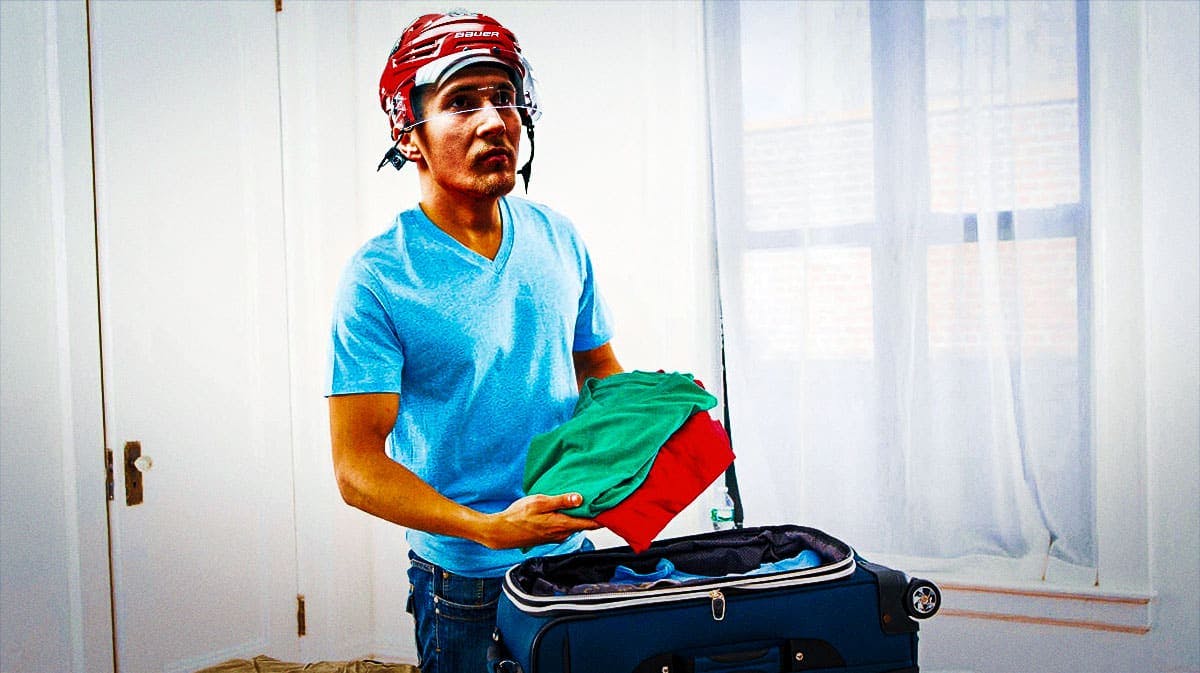 Martin Necas (Hurricanes) as a man packing his bags