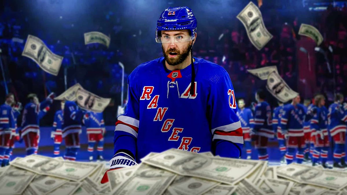 New York Rangers' Barclay Goodrow. Money flies all around him.