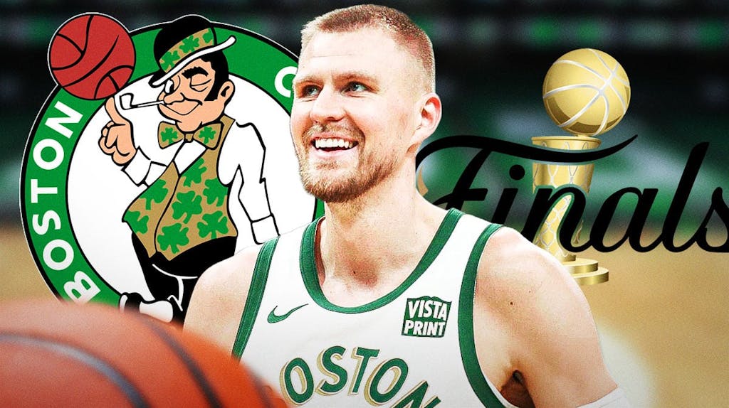 Celtics' Kristaps Porzingis with NBA Finals logo