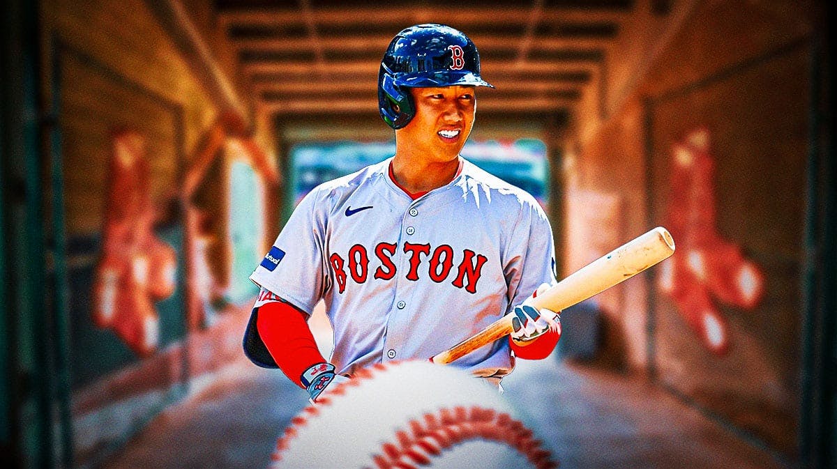 Red Sox Masataka Yoshida swinging a baseball bat at Fenway Park.