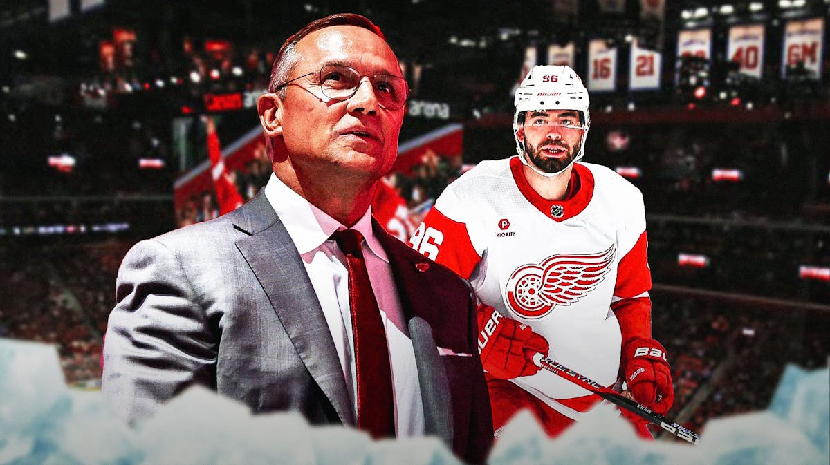 Detroit Red Wings GM Steve Yzerman with former Red Wings star Jake Walman. Please use Little Caesars Arena as the background image.