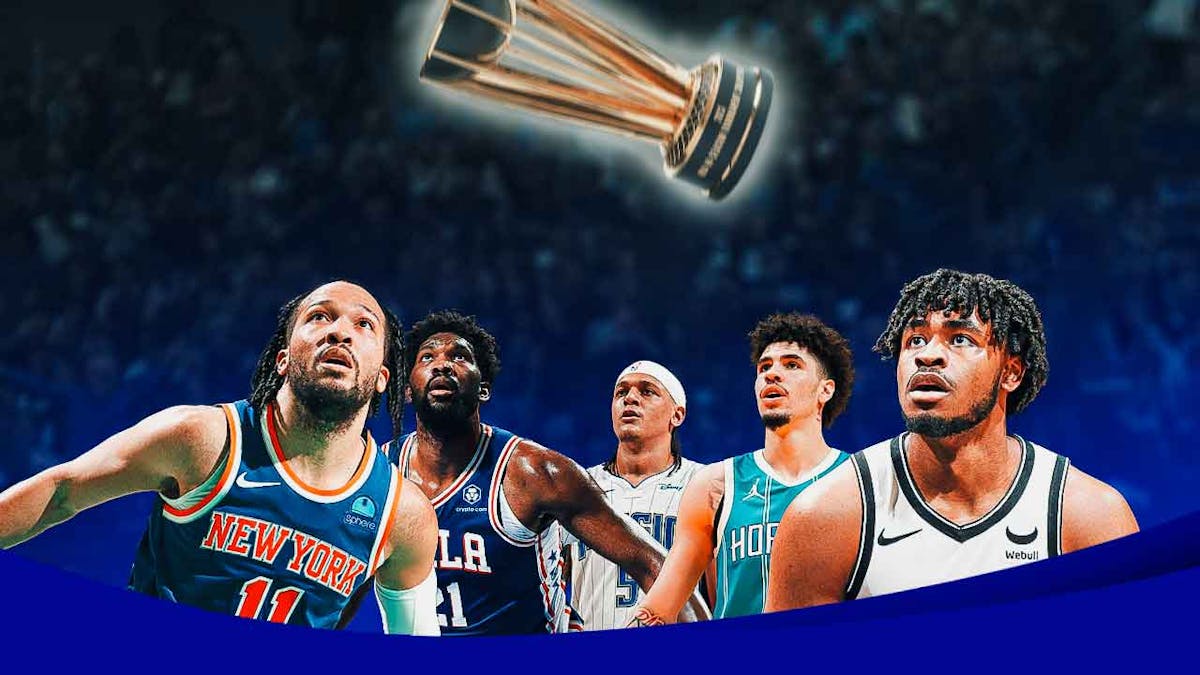 Knicks' Jalen Brunson, 76ers' Joel Embiid, Magic's Paolo Banchero, Hornets' LaMelo Ball, and Nets' Cam Thomas reaching for the NBA In-Season Tournament trophy