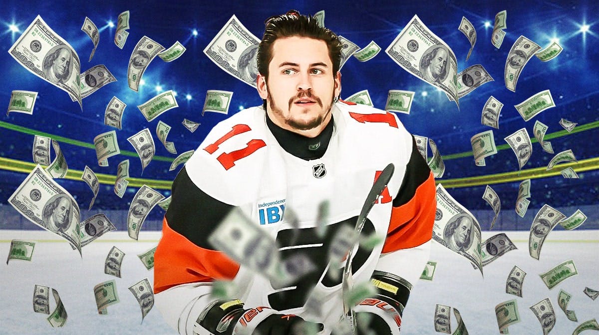Travis Konecny with money flying all around Philadelphia Flyers