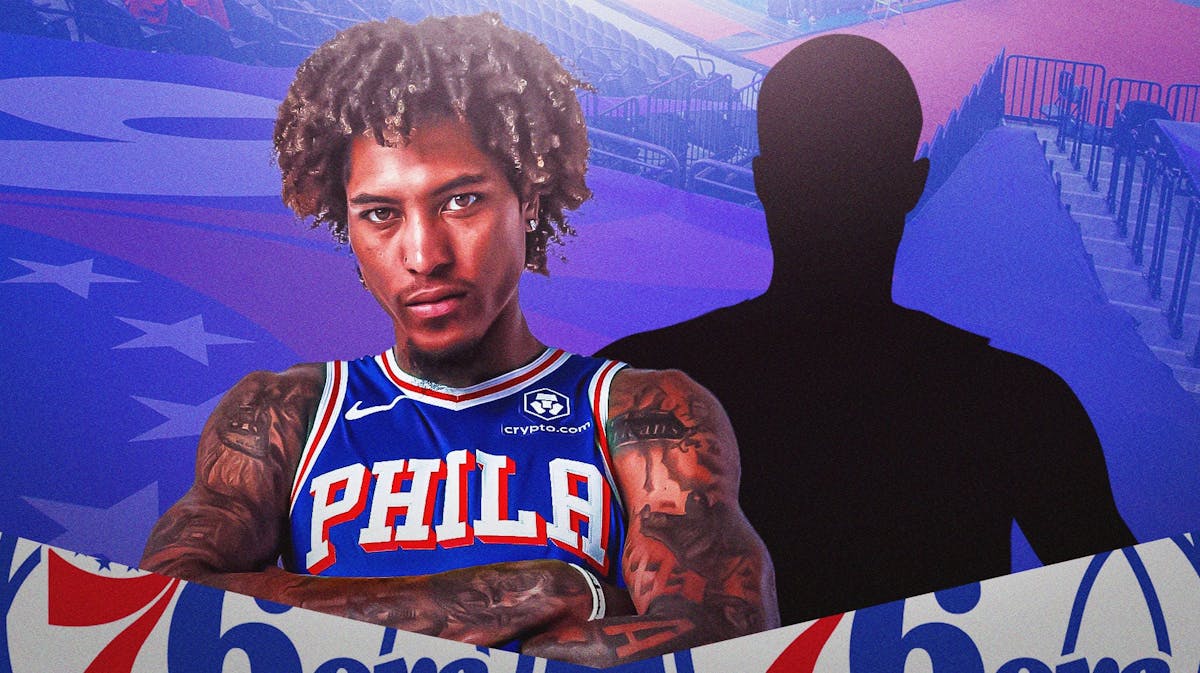 Kelly Oubre next to the blacked-out silhouette of Paul George in the Wells Fargo Center.