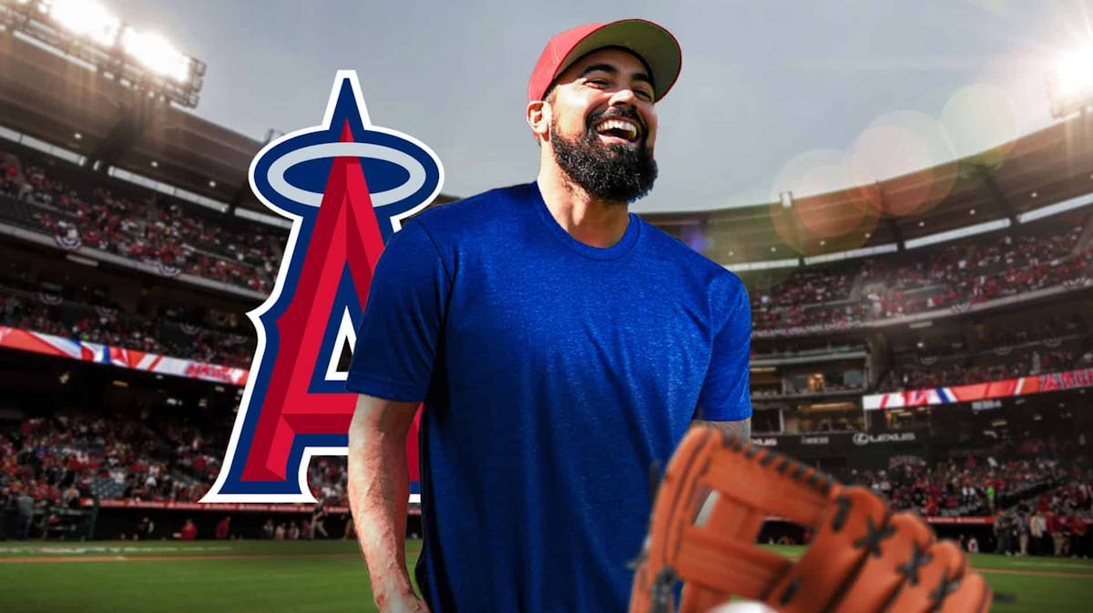 Anthony Rendon in street clothes with the Los Angeles Angels field behind him and an Angels logo next to him as Rendon is once again on the injured list where he has spent most of his time since joining the Angels.