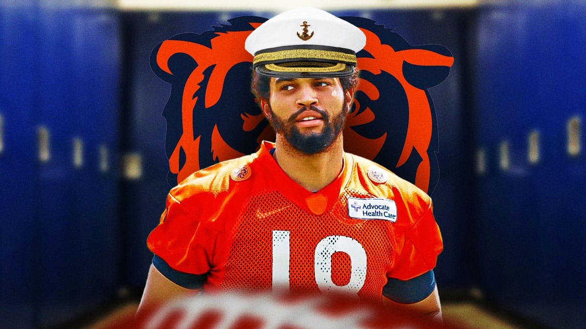Caleb Williams in a Bears jersey with a captain hat on with a locker room in the background.