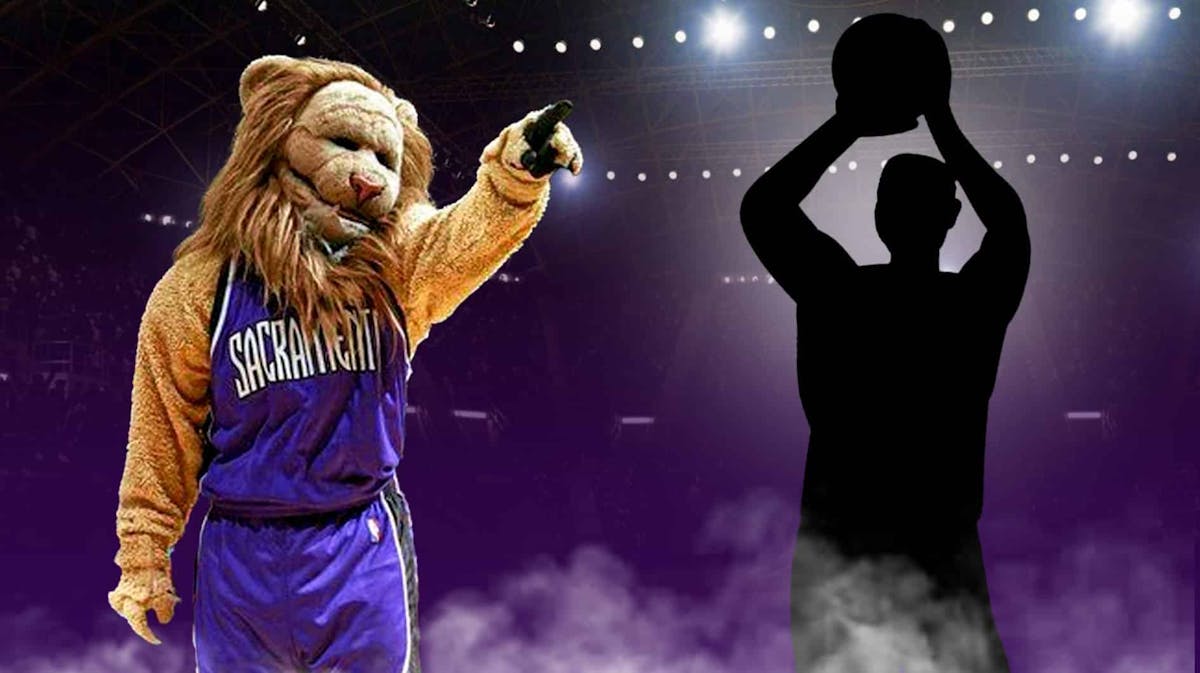 Sacramento Kings mascot (Slamson the Lion) and a mystery player