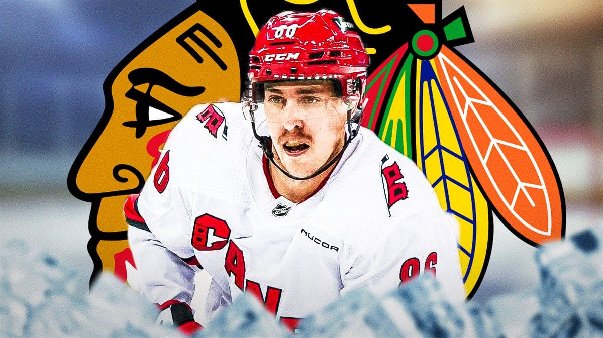 Teuvo Teravainen in image looking happy, Chicago Blackhawks logo, hockey rink in background