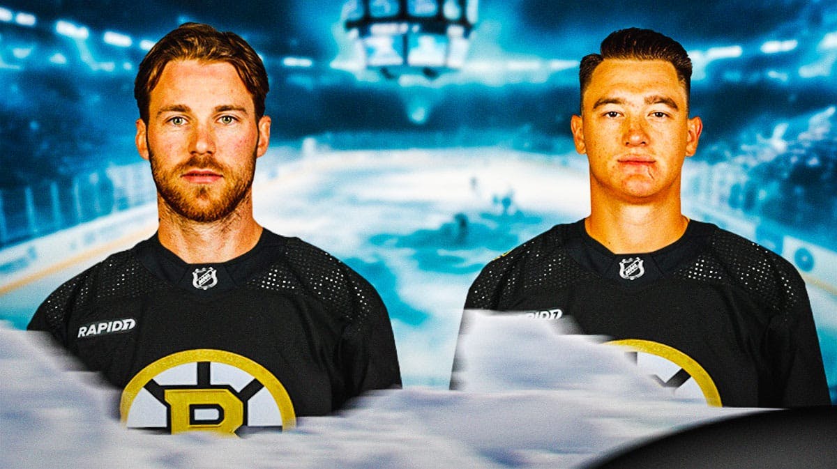 Nikita Zadorov and Elias Lindholm in Bruins gear.