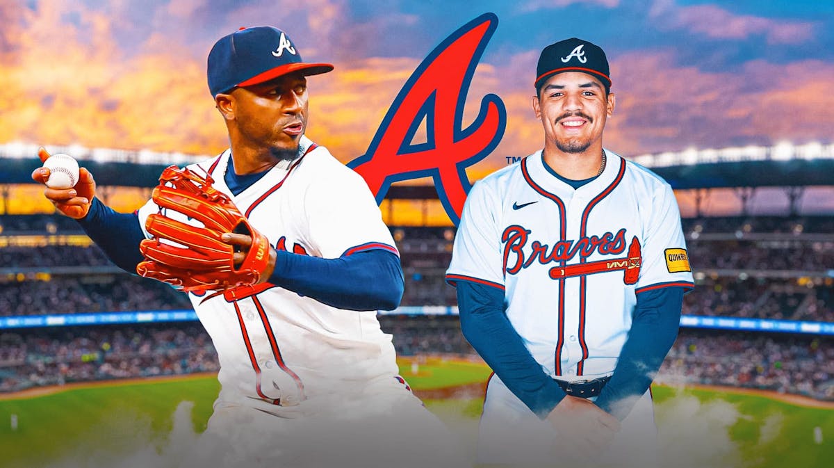 Ozzie Albies and Nacho Alvarez Jr. in front of a Braves logo
