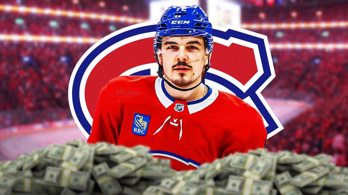 Arber Xhekaj (Canadiens) looking at a pile of money