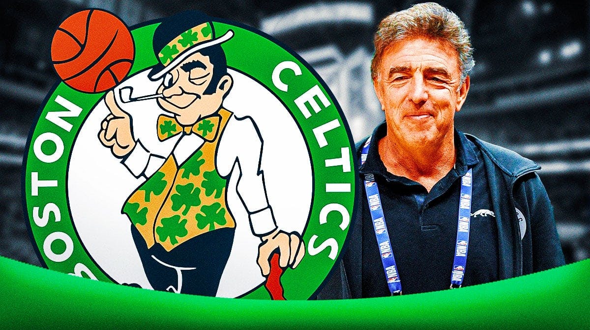 Wyc Grousbeck next to Celtics logo