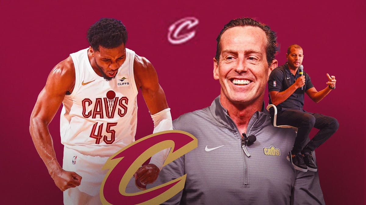 Cavs Donovan Mitchell next to Kenny Atkinson with Koby Altman on his shoulder