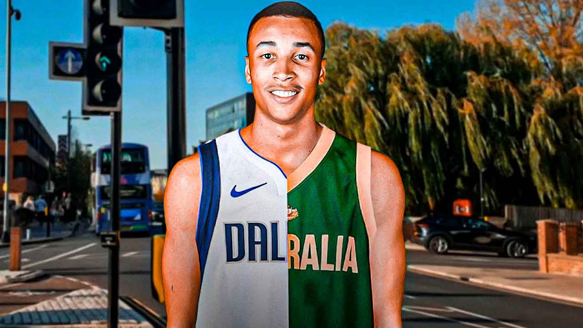 Dante Exum wearing half of a Dallas Mavericks jersey and half of Australia jersey with a green traffic light in the background.