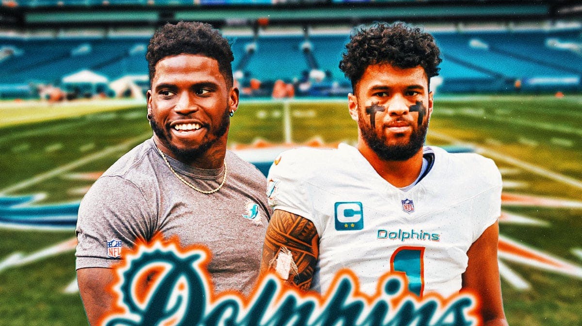 Miami Dolphins stars Tyreek Hill and Tua Tagovailoa in front of Hard Rock Stadium.