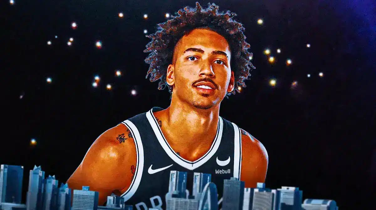 Nets rookie Jalen Wilson looking with a bright lights background