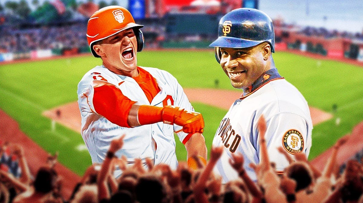 Giants' Tyler Fitzgerald hyped up, with Barry Bonds (2001 version) smiling beside him