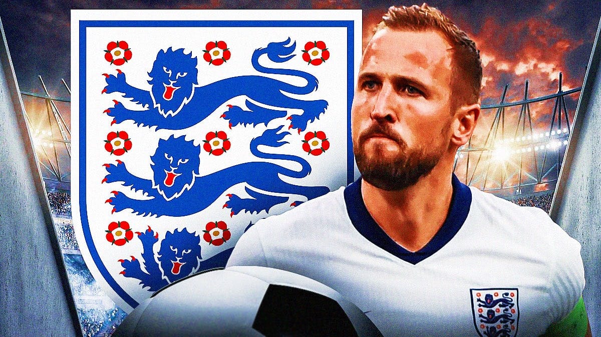 Harry Kane in front of the England team logo