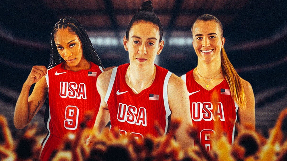 Team USA's Breanna Stewart in Olympic uniform. A'ja Wilson, Sabrina Ionescu behind her (also in Team USA uniform).