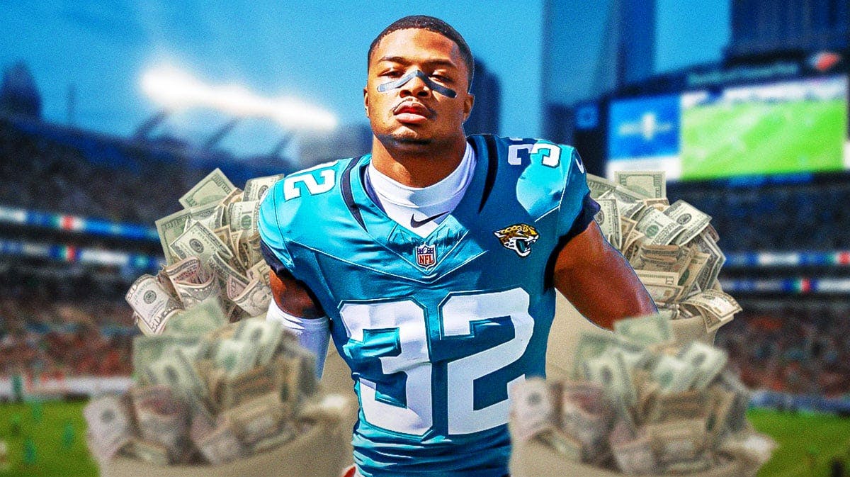 Jaguars' Tyson Campbell with money and money bags all around.
