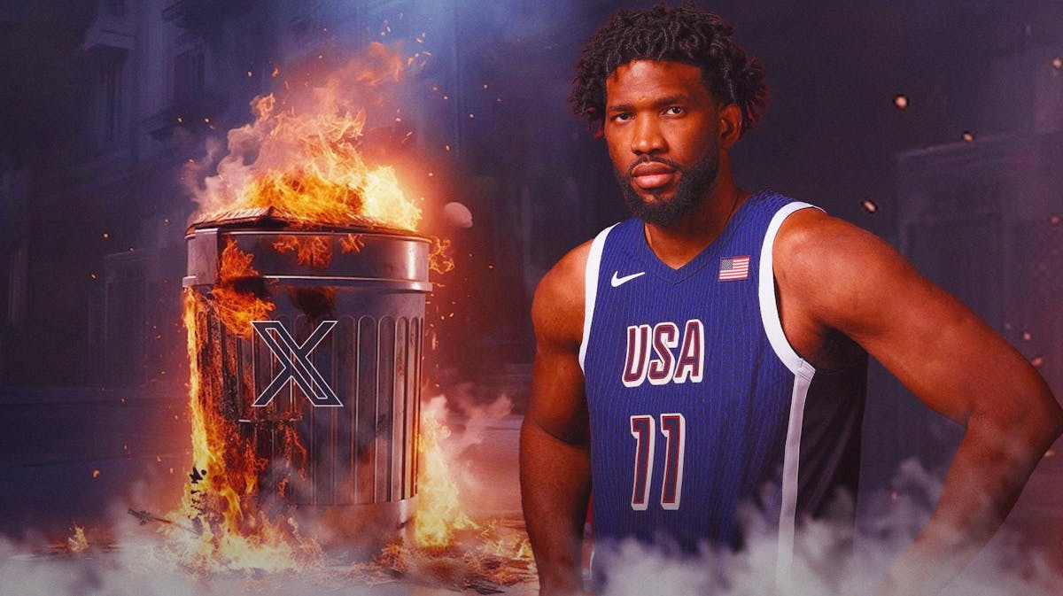 Joel Embiid beside a flaming garbage can that as n X logo on it