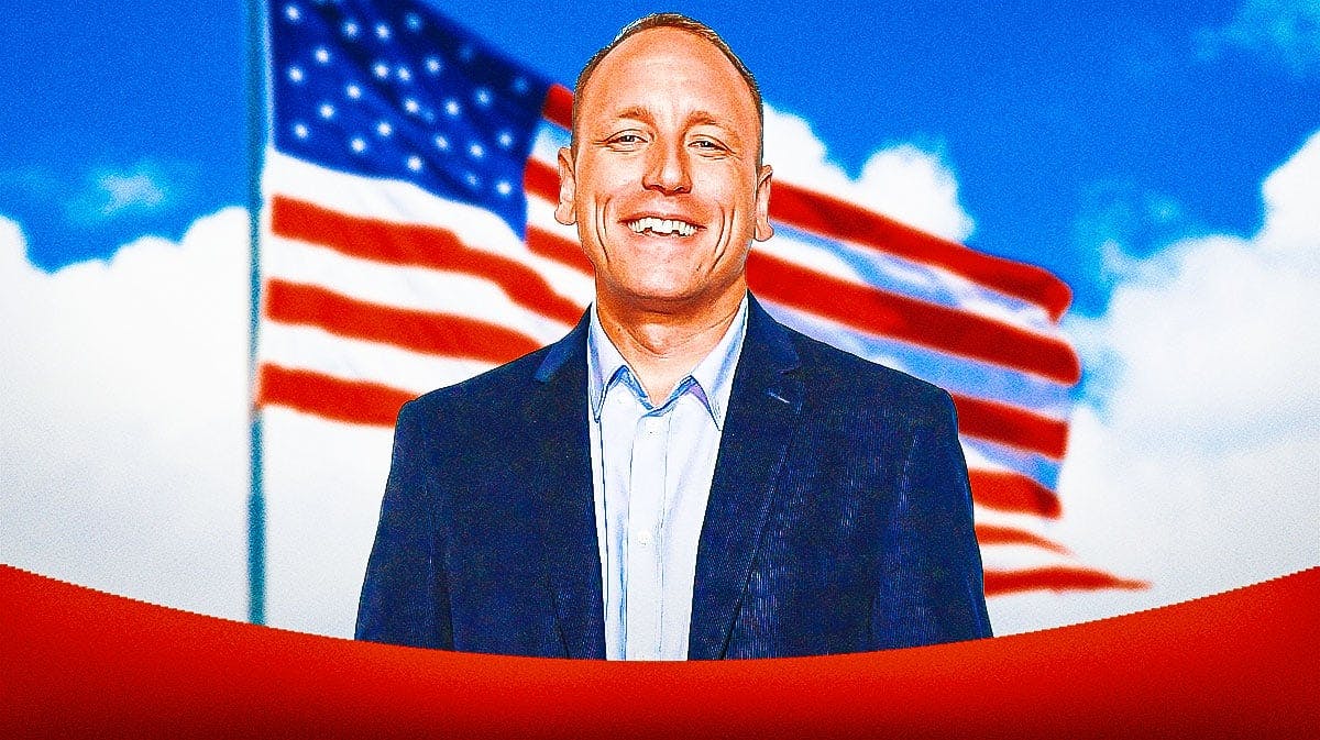 Joey Chestnut with an American flag behind him