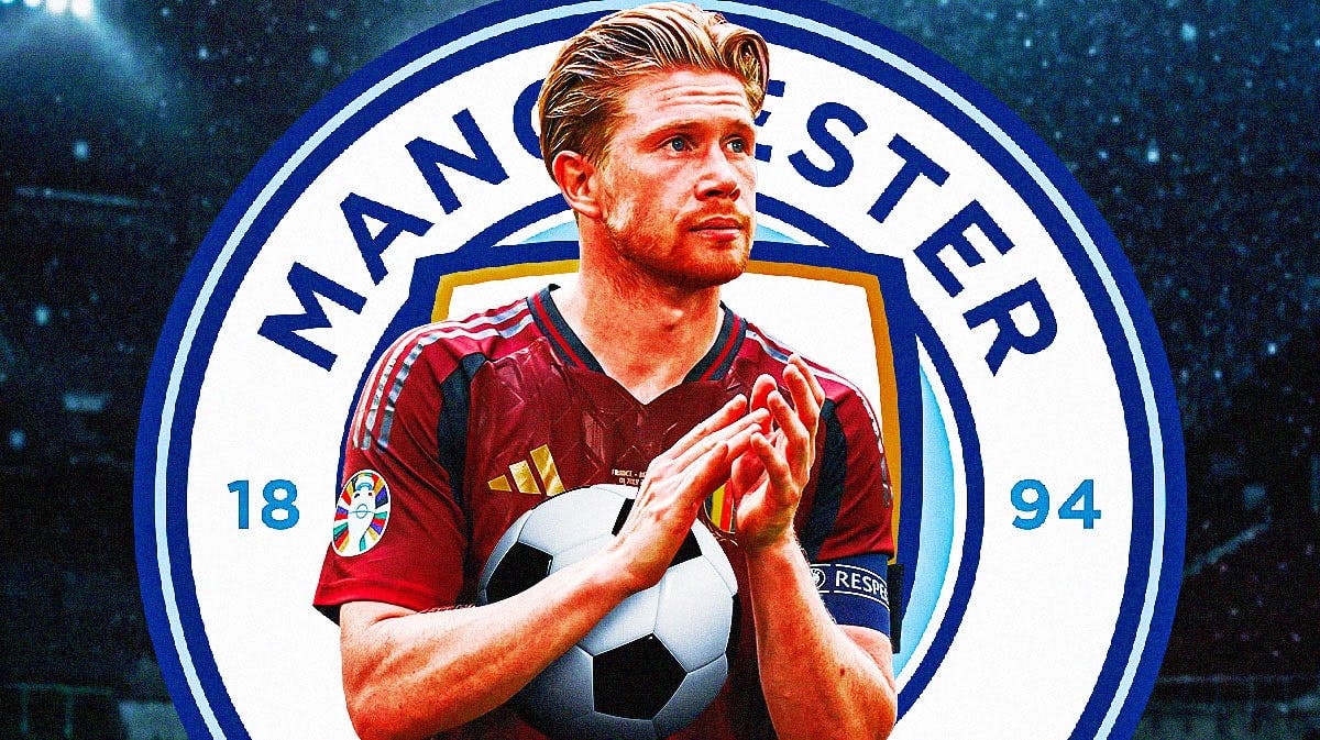 Kevin De Bruyne in front of the Manchester City logo