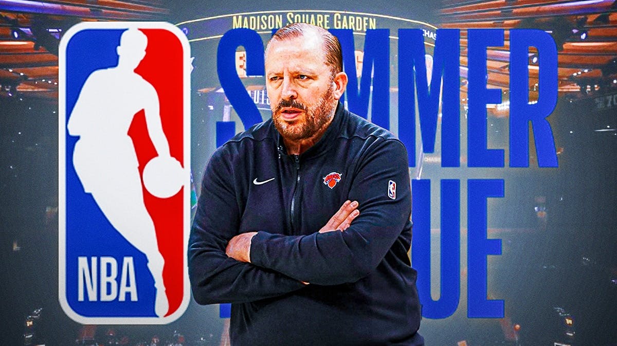 Knicks Tom Thibodeau in front of the Summer League logo at Madison Square Garden