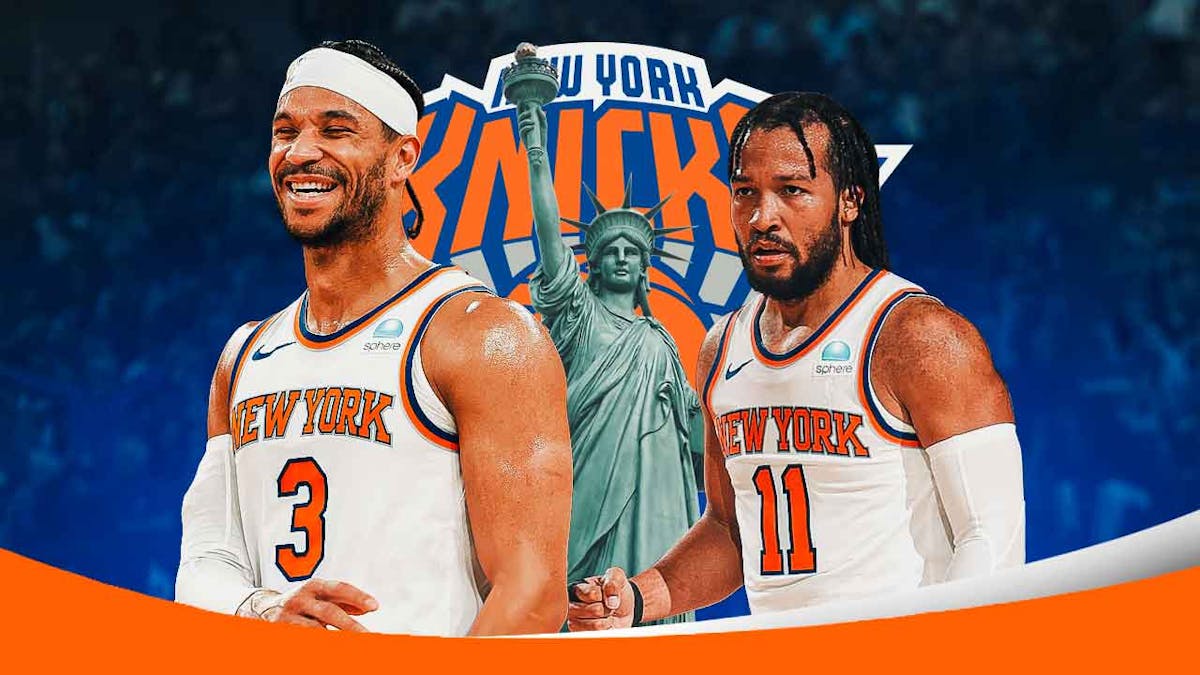 Knicks' Josh Hart stands next to Jalen Brunson after contract move, New York statue in background