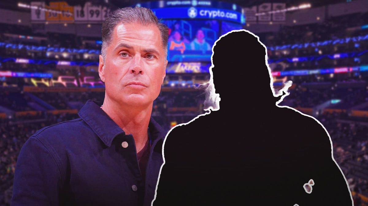 Rob Pelinka next to the blacked-out silhouette of Gary Trent Jr. in the Crypto.com Arena.