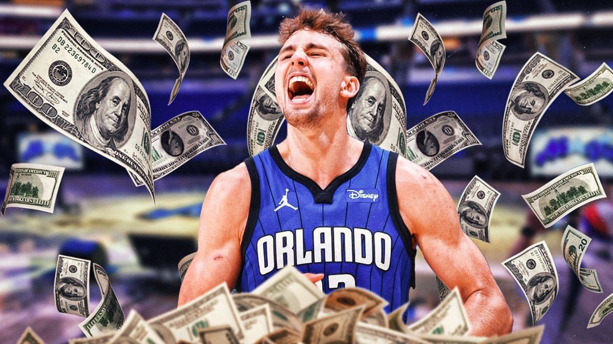 Magic's Franz Wagner with money falling around him
