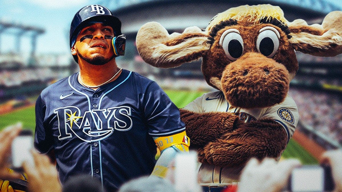 Isaac Paredes with Mariners mascot (The Mariner Moose)