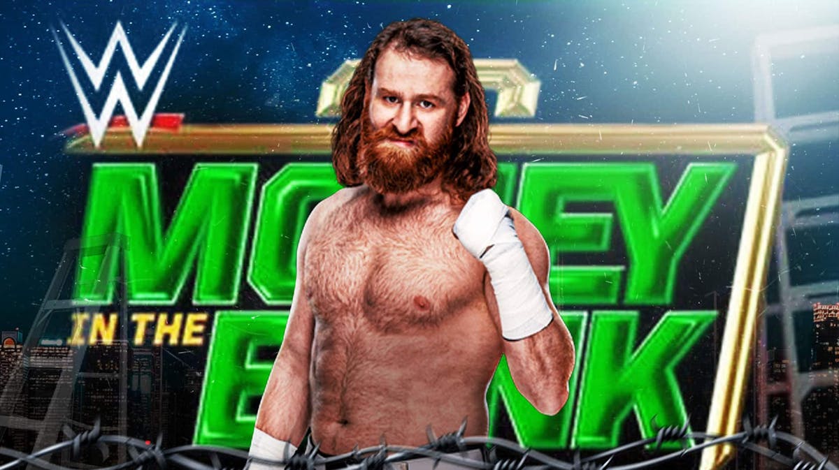 Sami Zayn in front of the Money in the Bank logo.