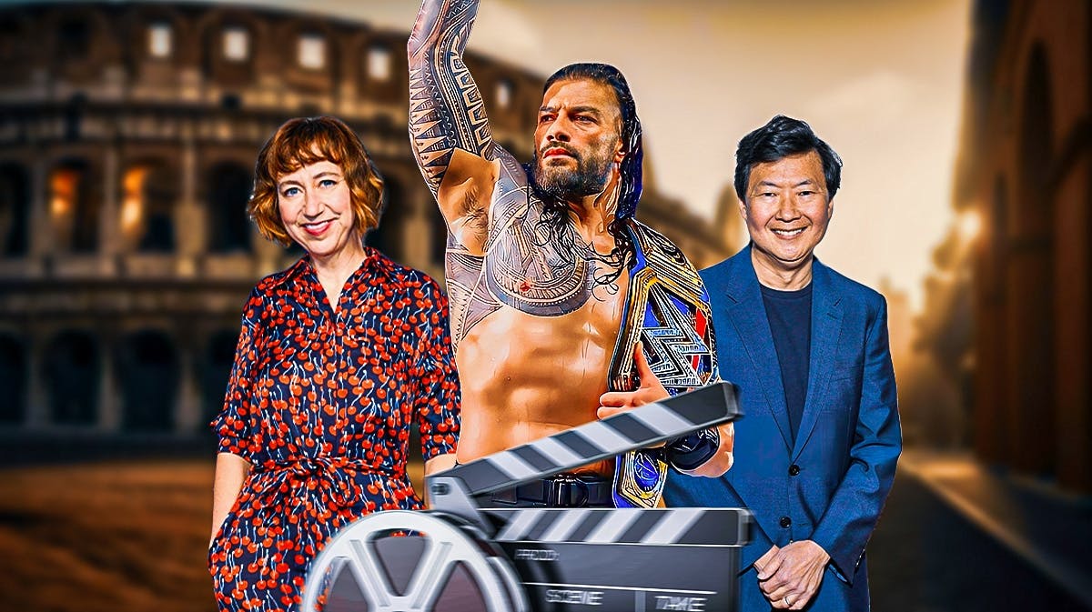 Rome background with My Spy 2 stars Kristen Schaal, Ken Jeong, and WWE star and Head of the Table Roman Reigns in the middle of them.