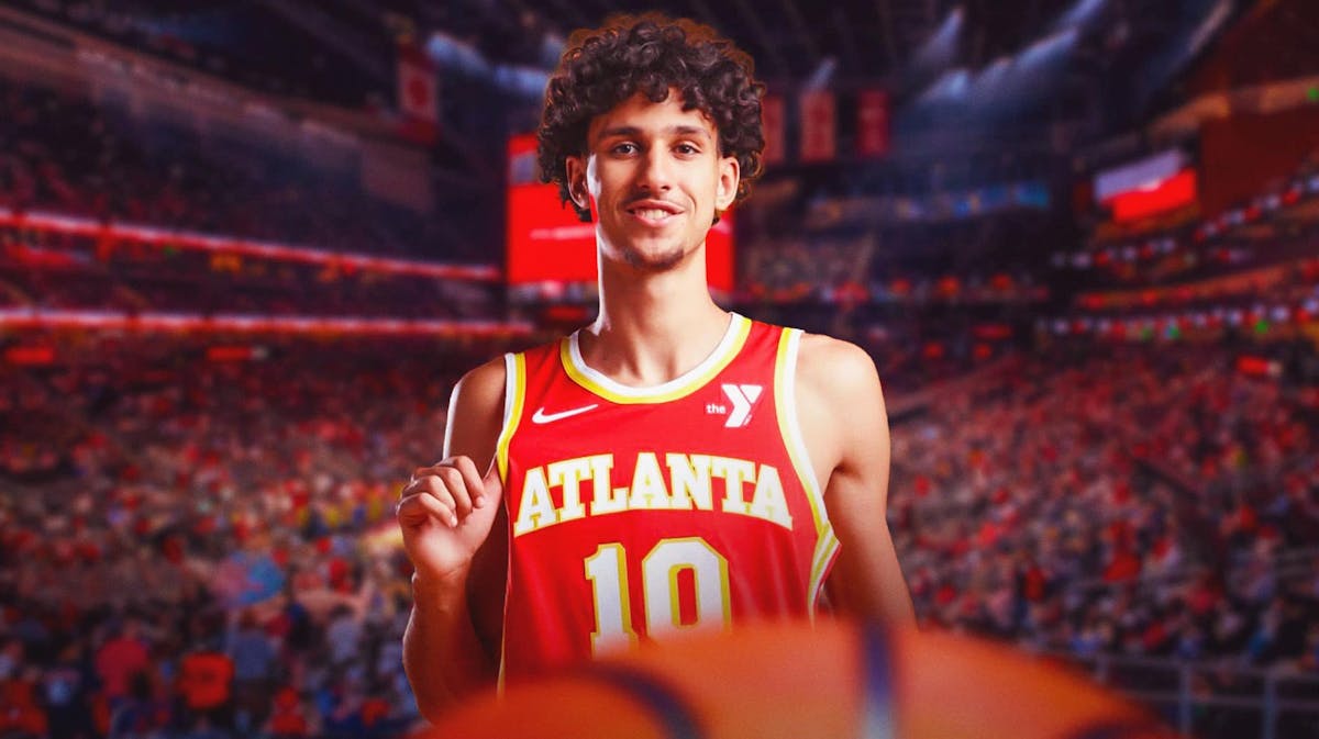 Zaccharie Risacher in his Atlanta Hawks jersey with the Hawks arena in the background, rookie