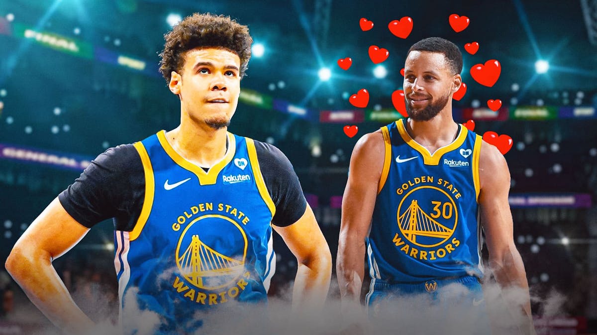 Nets' Cam Johnson in a Warriors uniform, with Stephen Curry smiling at him with hearts all over Curry