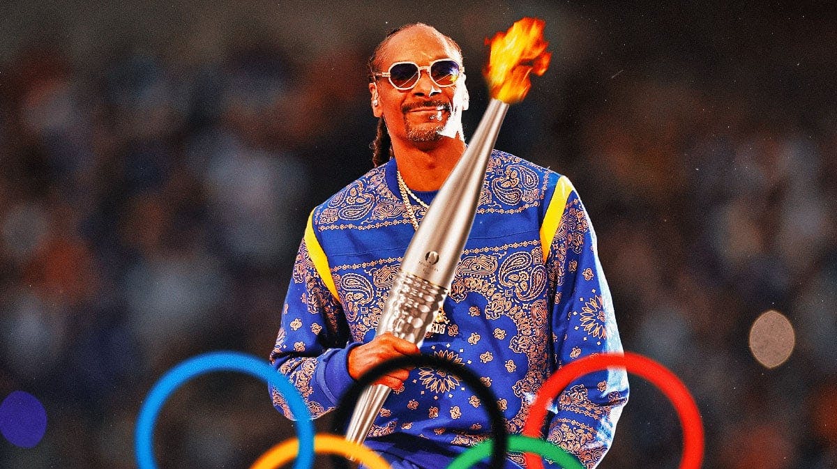 Snoop Dogg with the Olympic torch.