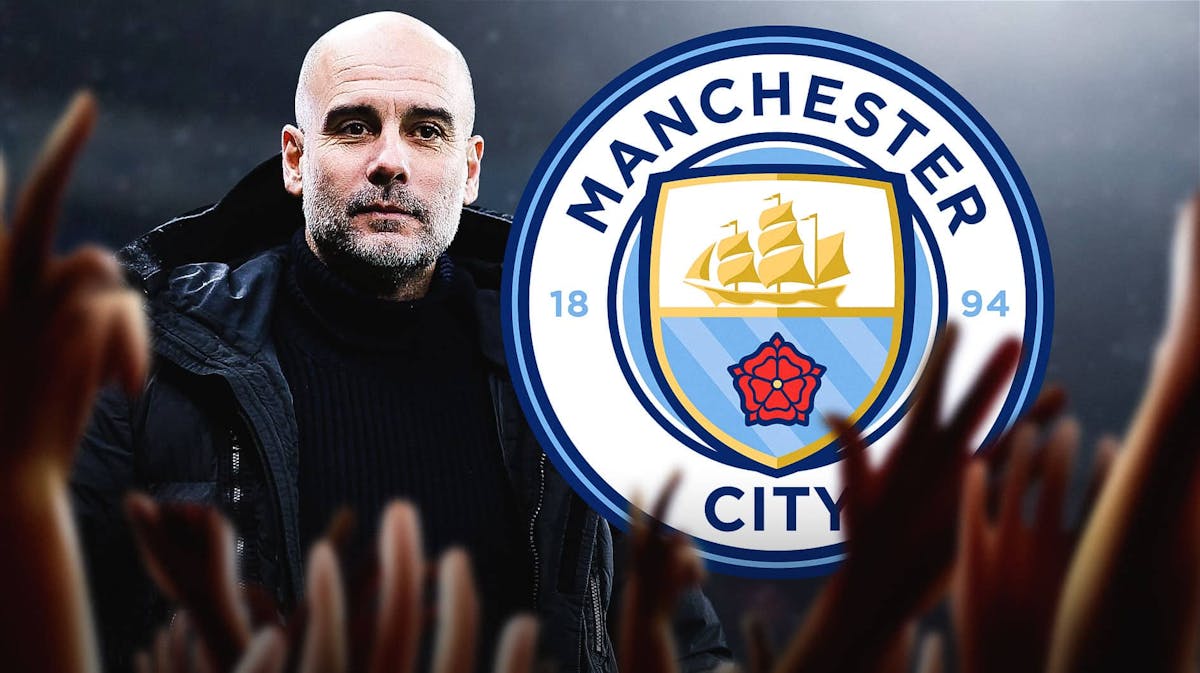 Pep Guardiola in front of the Manchester City logo