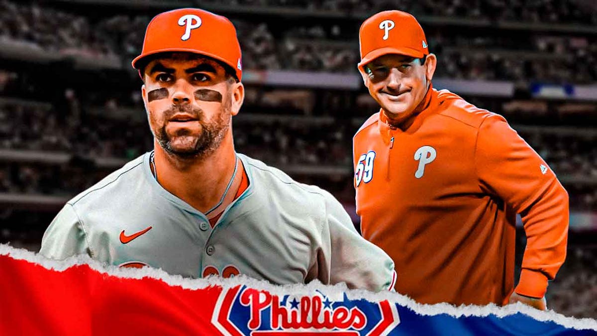 Phillies Whit Merrifield next to manager Rob Thompson