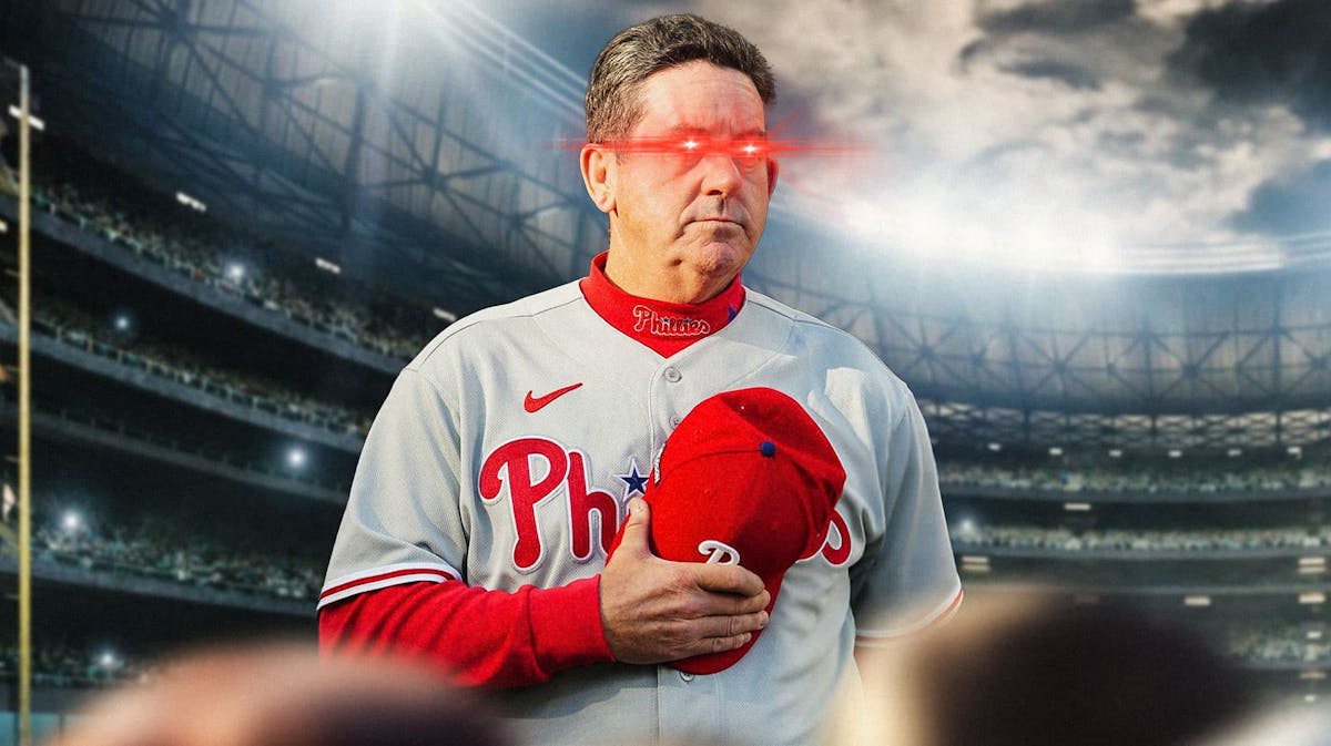 Phillies Rob Thomson with laser eyes talking to his team