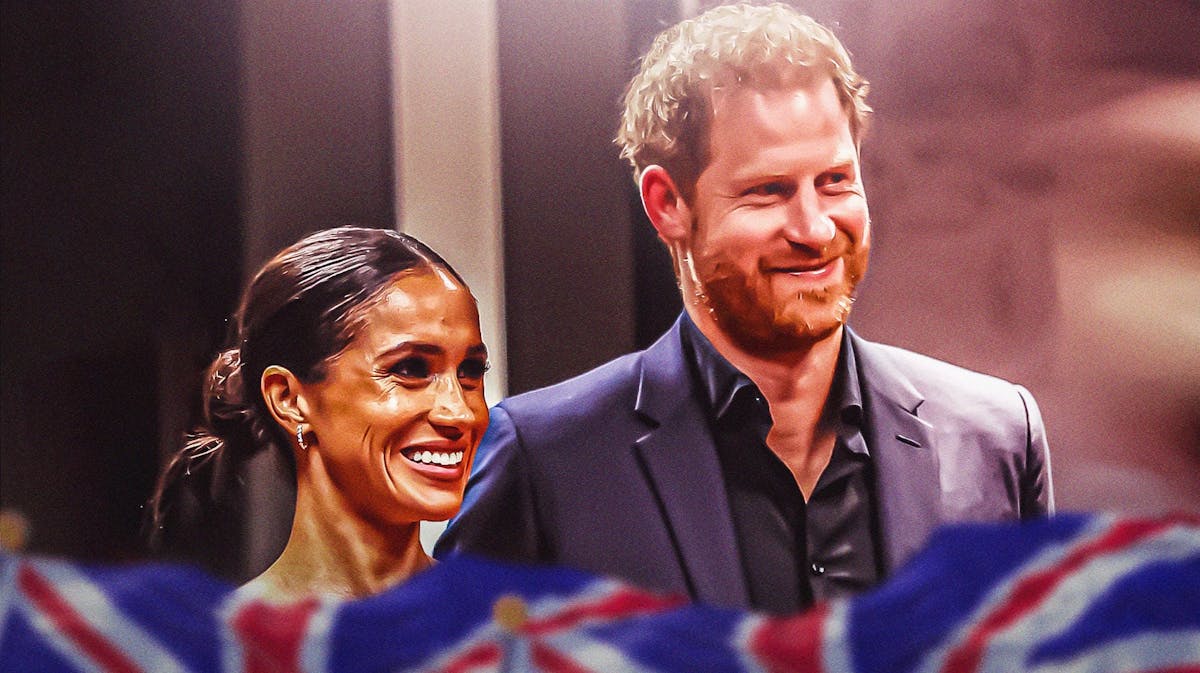 Prince Harry and Meghan Markle with the UK flag