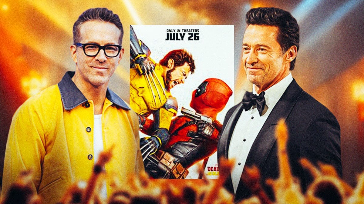 Ryan Reynolds and Hugh Jackman with Deadpool and Wolverine poster between them.