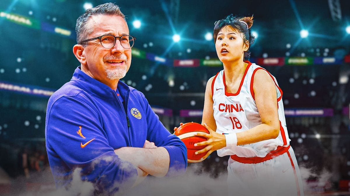 A recent/current picture of LA Sparks head coach Curt Miller alongside Li Yueru in her China basketball jersey with the Olympics logo in the background