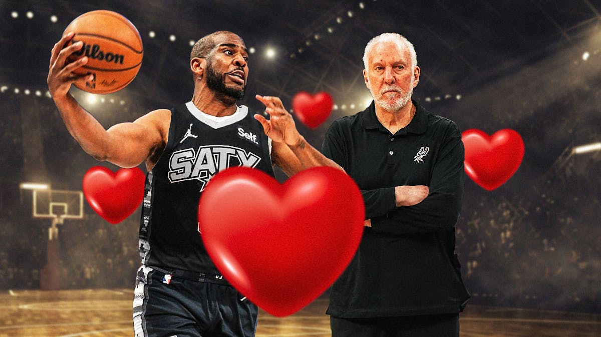 Spurs' Chris Paul with hearts all over him while smiling at Gregg Popovich