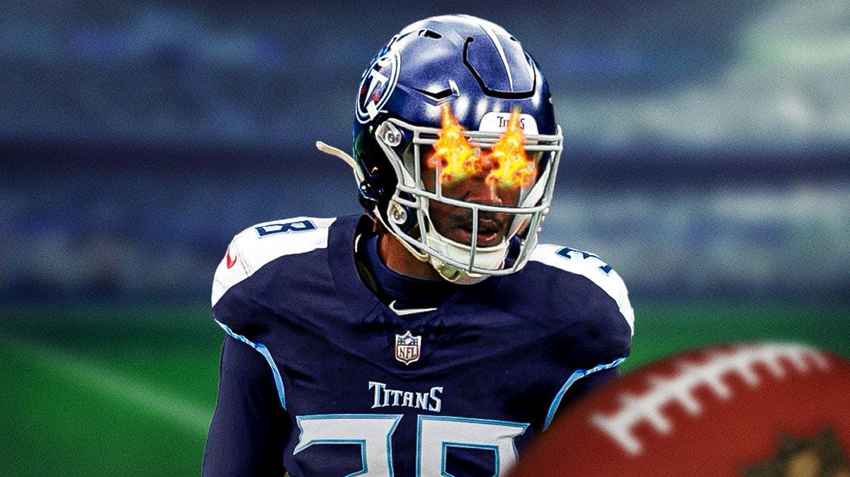 L'Jarius Sneed with fire on his eyes in a Titans uniform
