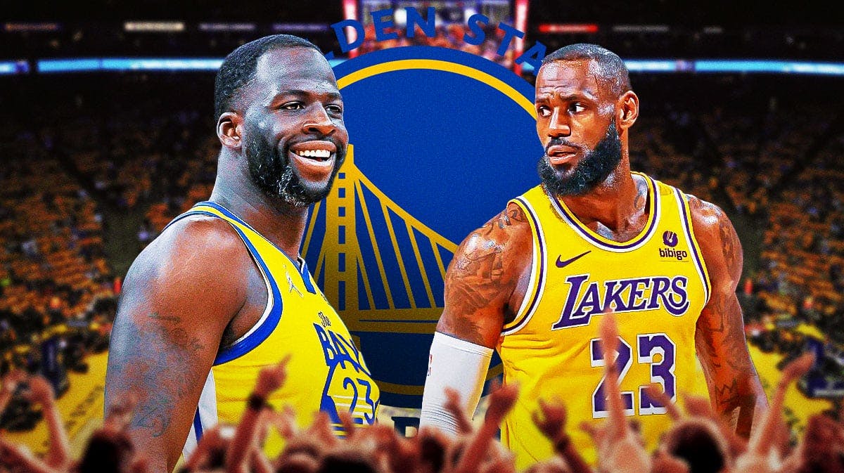 Warriors forward Draymond Green stands next Lakers' LeBron James