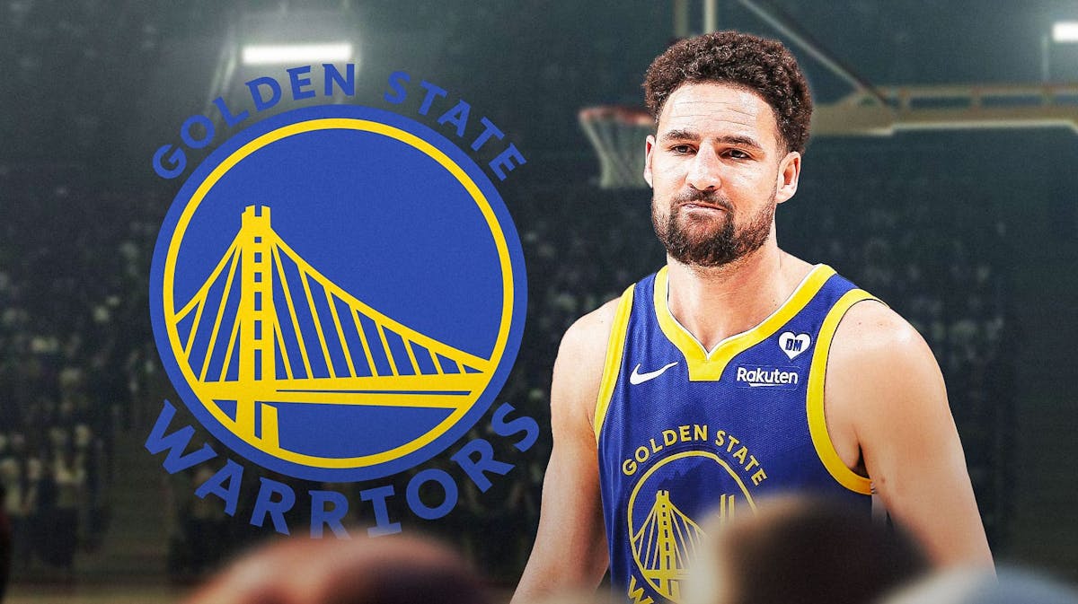 Warriors' Klay Thompson looks at Dubs fans after trade, Mavericks fans in background