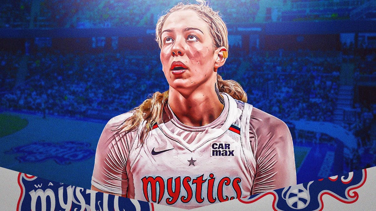 Emily Engstler in her Washington Mystics jersey with the Mystics arena in the background.