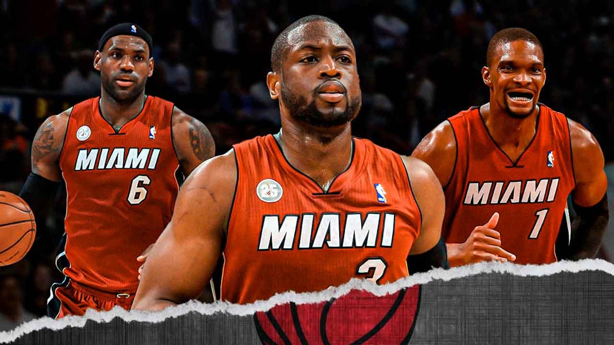 Heat's Dwyane Wade looking angrily at Chris Bosh and LeBron James together in Heat unis (2012 version)
